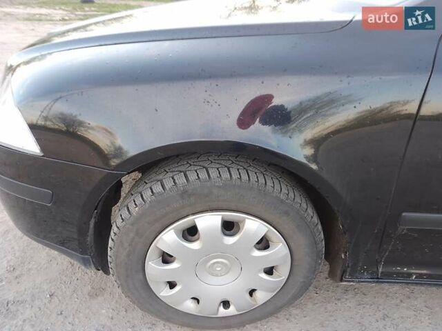 Черный Шкода Октавия, объемом двигателя 1.6 л и пробегом 217 тыс. км за 5800 $, фото 1 на Automoto.ua