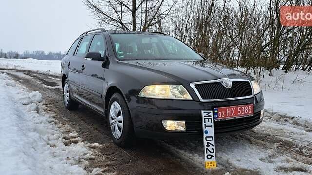 Черный Шкода Октавия, объемом двигателя 1.6 л и пробегом 198 тыс. км за 5650 $, фото 1 на Automoto.ua