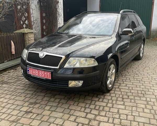 Черный Шкода Октавия, объемом двигателя 1.6 л и пробегом 183 тыс. км за 5900 $, фото 1 на Automoto.ua