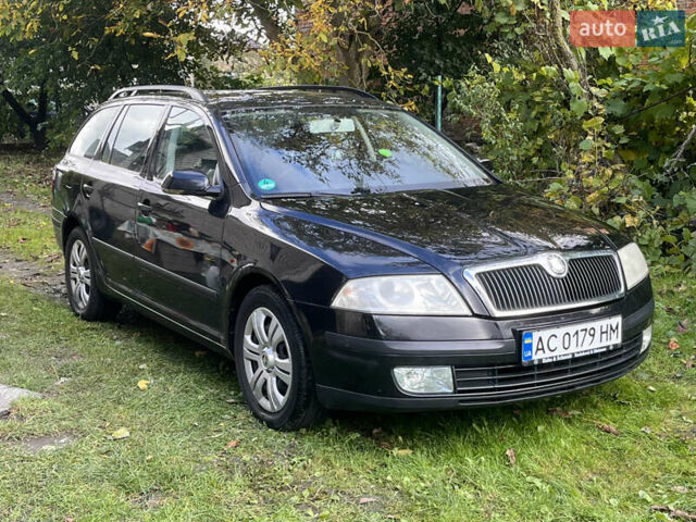 Черный Шкода Октавия, объемом двигателя 1.6 л и пробегом 192 тыс. км за 5600 $, фото 1 на Automoto.ua