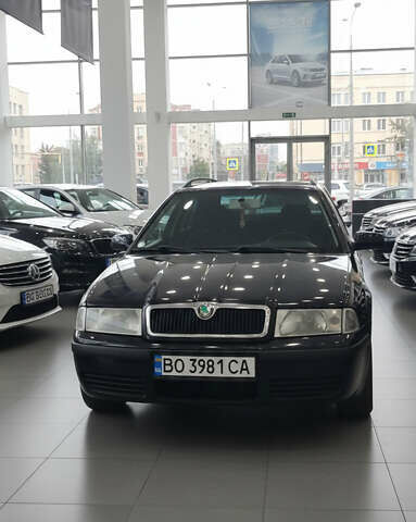 Черный Шкода Октавия, объемом двигателя 1.6 л и пробегом 420 тыс. км за 4900 $, фото 1 на Automoto.ua