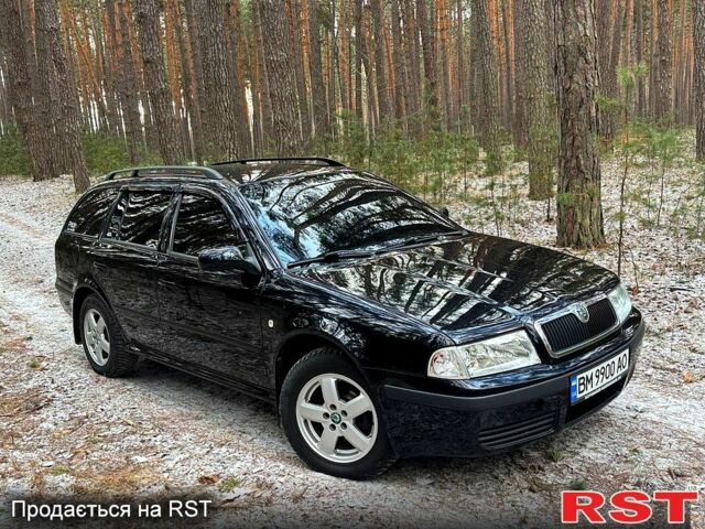 Черный Шкода Октавия, объемом двигателя 1.6 л и пробегом 200 тыс. км за 6400 $, фото 1 на Automoto.ua