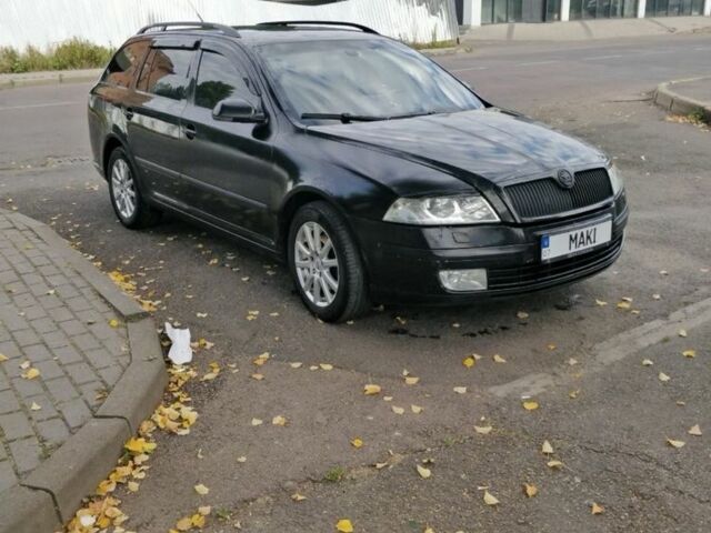 Черный Шкода Октавия, объемом двигателя 2 л и пробегом 300 тыс. км за 5500 $, фото 1 на Automoto.ua