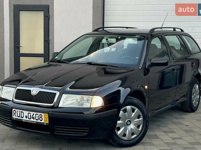 Черный Шкода Октавия, объемом двигателя 1.6 л и пробегом 169 тыс. км за 5850 $, фото 1 на Automoto.ua