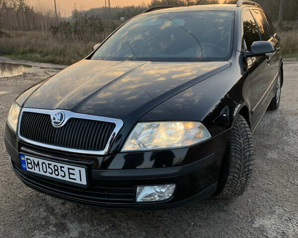 Черный Шкода Октавия, объемом двигателя 1.6 л и пробегом 265 тыс. км за 6000 $, фото 1 на Automoto.ua