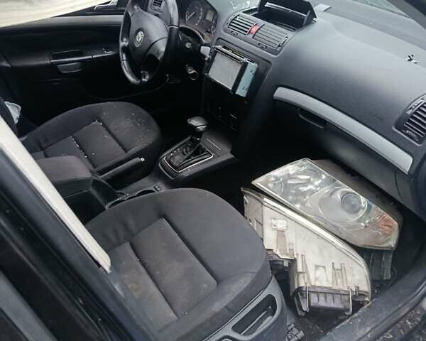 Черный Шкода Октавия, объемом двигателя 1.6 л и пробегом 210 тыс. км за 2000 $, фото 1 на Automoto.ua