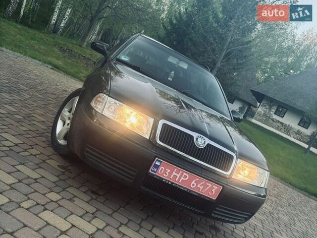 Черный Шкода Октавия, объемом двигателя 1.6 л и пробегом 218 тыс. км за 5800 $, фото 1 на Automoto.ua