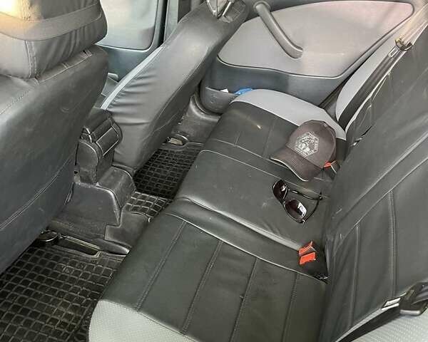 Черный Шкода Октавия, объемом двигателя 1.8 л и пробегом 343 тыс. км за 5550 $, фото 1 на Automoto.ua