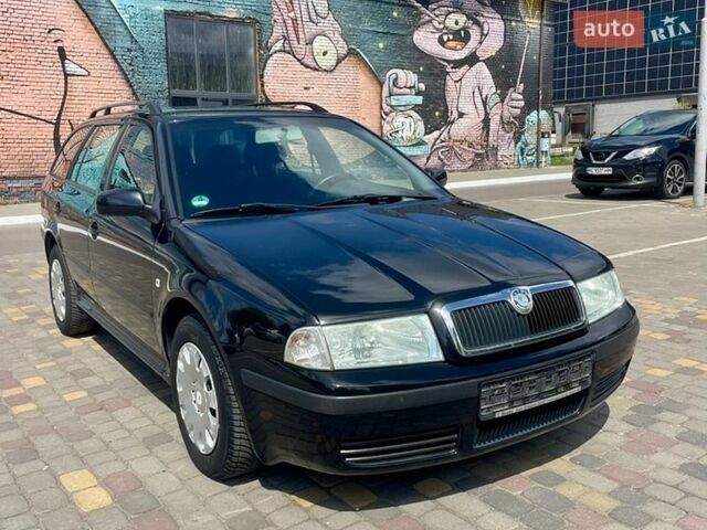 Черный Шкода Октавия, объемом двигателя 1.6 л и пробегом 235 тыс. км за 5200 $, фото 1 на Automoto.ua