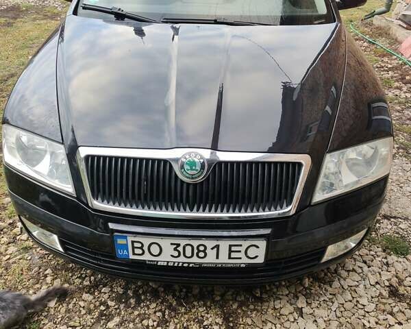 Черный Шкода Октавия, объемом двигателя 1.6 л и пробегом 210 тыс. км за 6199 $, фото 1 на Automoto.ua