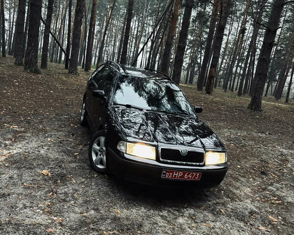 Черный Шкода Октавия, объемом двигателя 1.6 л и пробегом 217 тыс. км за 5999 $, фото 1 на Automoto.ua
