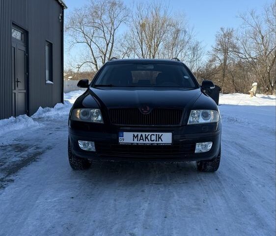 Черный Шкода Октавия, объемом двигателя 2 л и пробегом 283 тыс. км за 5000 $, фото 1 на Automoto.ua