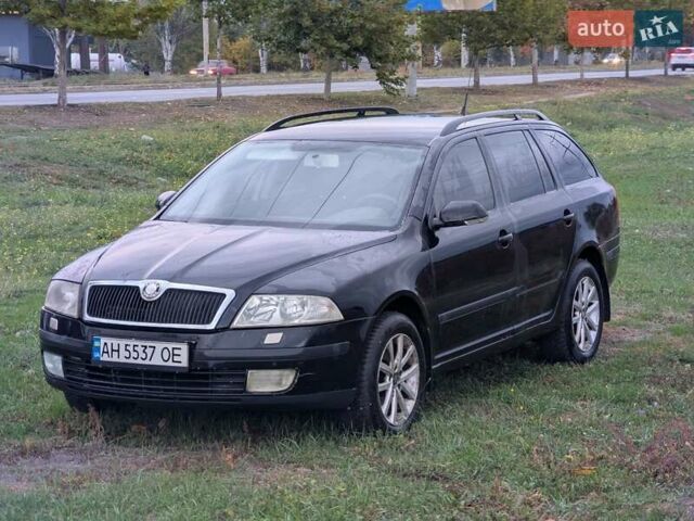 Черный Шкода Октавия, объемом двигателя 1.6 л и пробегом 313 тыс. км за 3500 $, фото 1 на Automoto.ua