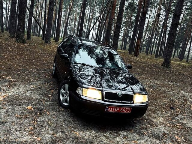 Черный Шкода Октавия, объемом двигателя 1.6 л и пробегом 217 тыс. км за 5999 $, фото 1 на Automoto.ua