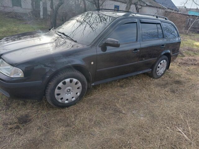 Черный Шкода Октавия, объемом двигателя 1.6 л и пробегом 137 тыс. км за 6500 $, фото 1 на Automoto.ua