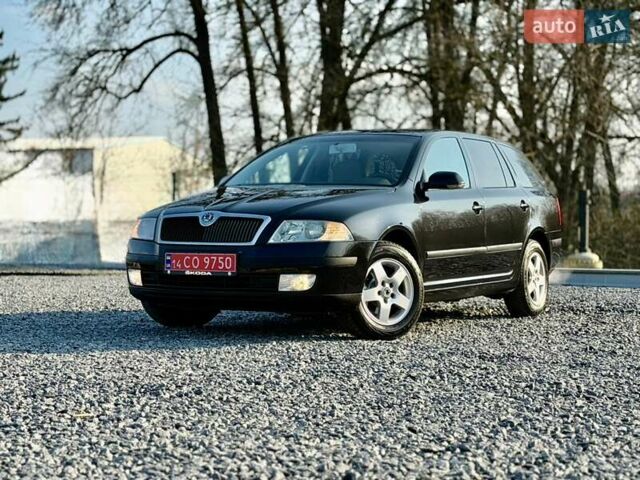 Черный Шкода Октавия, объемом двигателя 1.6 л и пробегом 212 тыс. км за 5450 $, фото 1 на Automoto.ua
