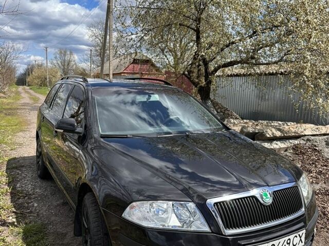 Черный Шкода Октавия, объемом двигателя 2 л и пробегом 330 тыс. км за 6000 $, фото 1 на Automoto.ua