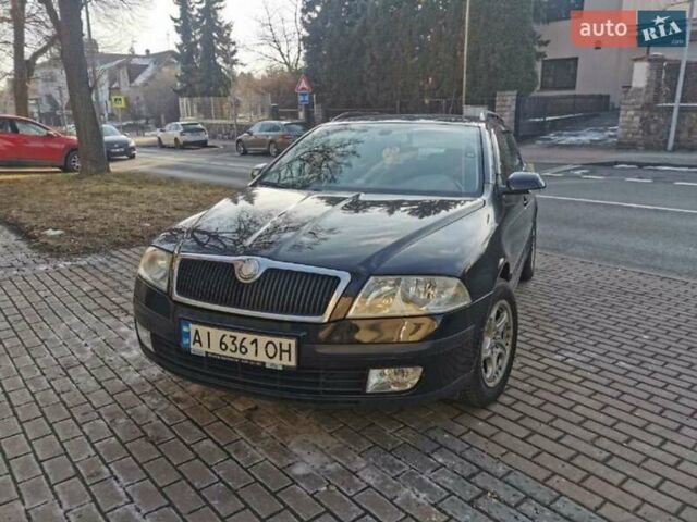 Черный Шкода Октавия, объемом двигателя 1.6 л и пробегом 286 тыс. км за 5600 $, фото 1 на Automoto.ua