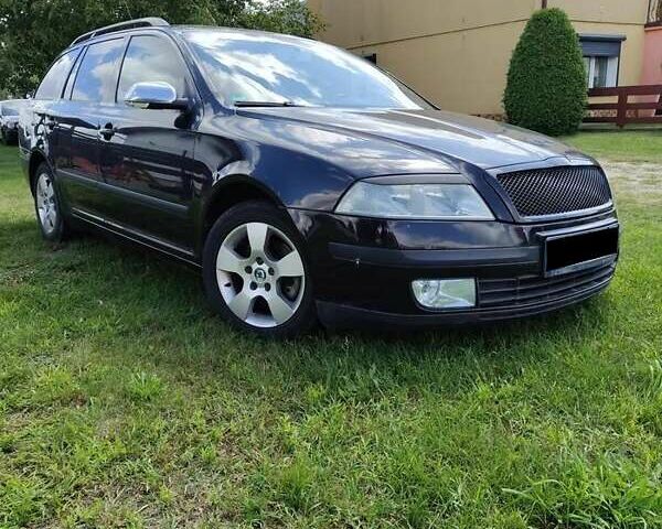 Черный Шкода Октавия, объемом двигателя 2 л и пробегом 234 тыс. км за 8100 $, фото 1 на Automoto.ua