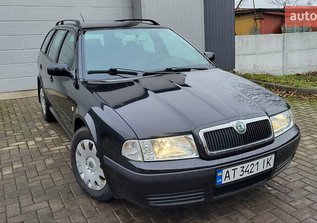 Черный Шкода Октавия, объемом двигателя 1.6 л и пробегом 158 тыс. км за 5950 $, фото 1 на Automoto.ua