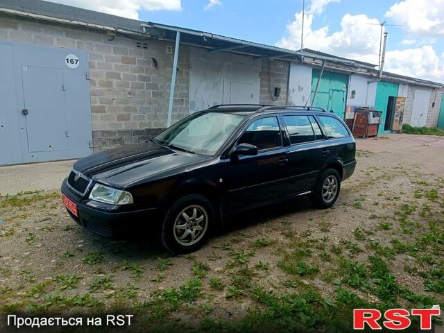 Черный Шкода Октавия, объемом двигателя 1.6 л и пробегом 218 тыс. км за 5500 $, фото 1 на Automoto.ua