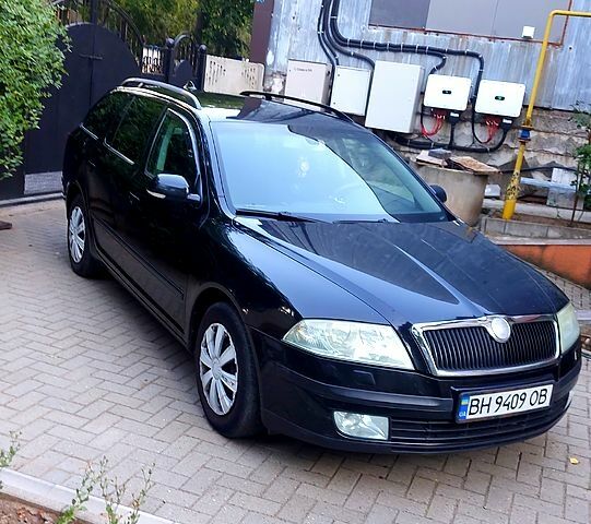 Черный Шкода Октавия, объемом двигателя 2 л и пробегом 314 тыс. км за 6300 $, фото 1 на Automoto.ua