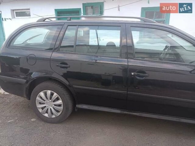 Чорний Шкода Октавія, об'ємом двигуна 1.6 л та пробігом 274 тис. км за 4850 $, фото 1 на Automoto.ua
