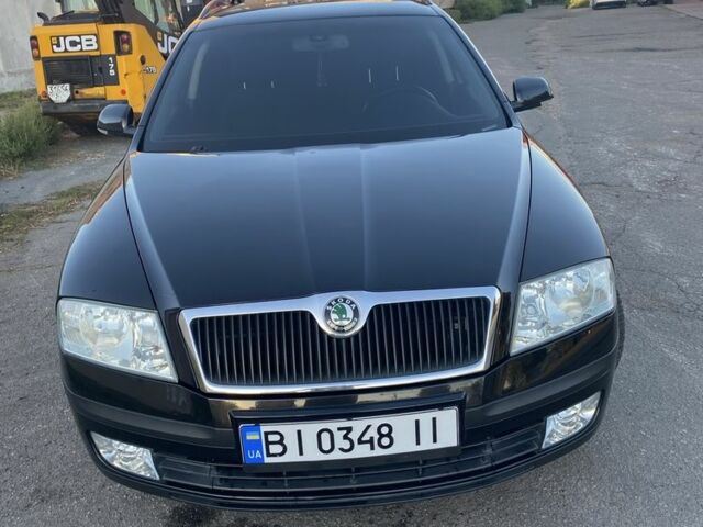 Черный Шкода Октавия, объемом двигателя 1.6 л и пробегом 205 тыс. км за 6799 $, фото 1 на Automoto.ua