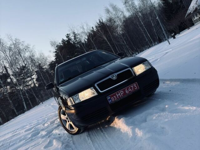 Черный Шкода Октавия, объемом двигателя 1.6 л и пробегом 217 тыс. км за 6300 $, фото 1 на Automoto.ua
