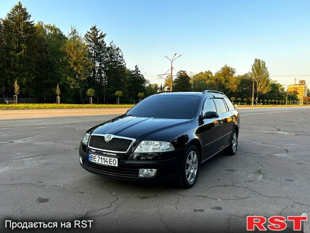 Черный Шкода Октавия, объемом двигателя 2 л и пробегом 229 тыс. км за 5750 $, фото 1 на Automoto.ua