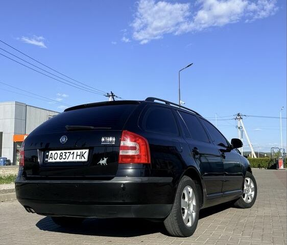 Черный Шкода Октавия, объемом двигателя 2 л и пробегом 236 тыс. км за 5500 $, фото 1 на Automoto.ua