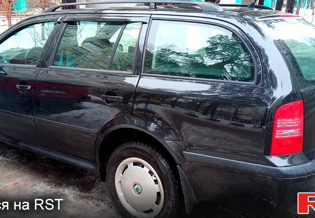 Чорний Шкода Октавія, об'ємом двигуна 1.6 л та пробігом 26700 тис. км за 5900 $, фото 1 на Automoto.ua