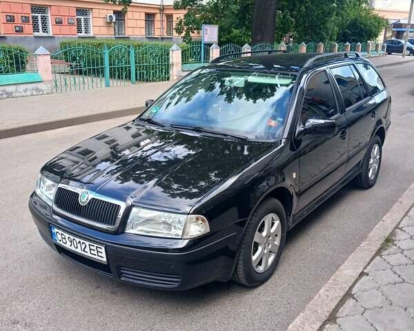Черный Шкода Октавия, объемом двигателя 1.6 л и пробегом 248 тыс. км за 5000 $, фото 1 на Automoto.ua
