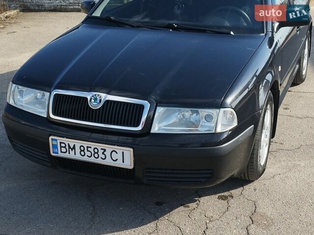 Черный Шкода Октавия, объемом двигателя 1.6 л и пробегом 256 тыс. км за 5500 $, фото 1 на Automoto.ua