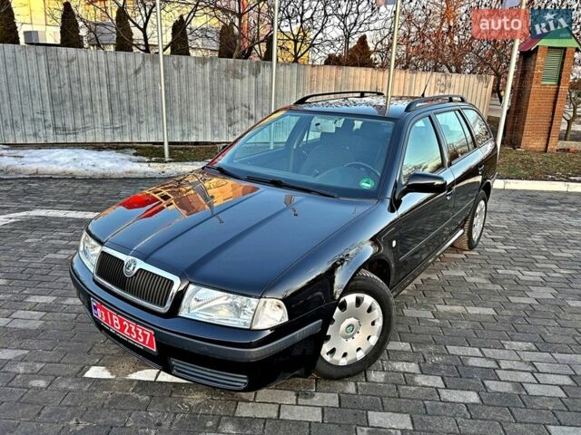 Черный Шкода Октавия, объемом двигателя 1.6 л и пробегом 156 тыс. км за 5799 $, фото 1 на Automoto.ua