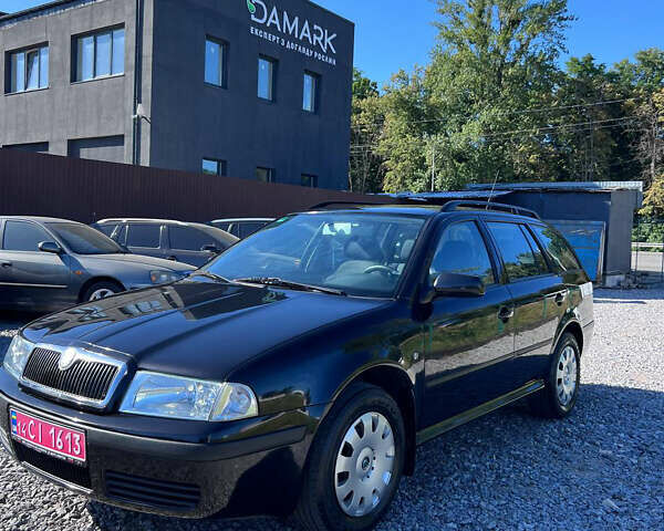 Черный Шкода Октавия, объемом двигателя 1.6 л и пробегом 234 тыс. км за 5200 $, фото 1 на Automoto.ua