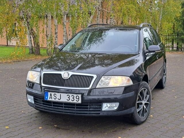 Черный Шкода Октавия, объемом двигателя 2 л и пробегом 215 тыс. км за 1750 $, фото 1 на Automoto.ua