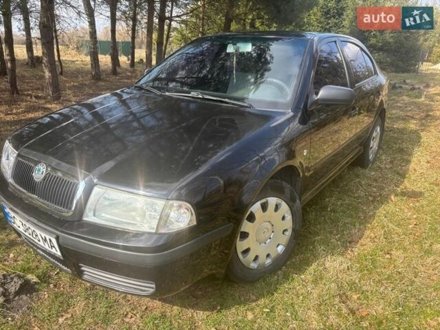 Черный Шкода Октавия, объемом двигателя 1.6 л и пробегом 227 тыс. км за 5300 $, фото 1 на Automoto.ua