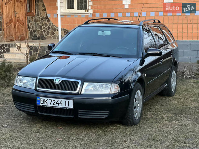 Черный Шкода Октавия, объемом двигателя 1.6 л и пробегом 209 тыс. км за 5999 $, фото 1 на Automoto.ua