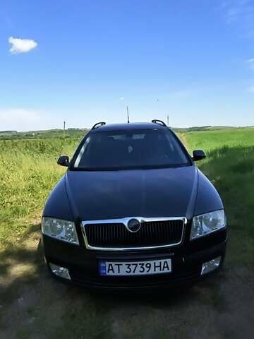 Черный Шкода Октавия, объемом двигателя 1.6 л и пробегом 227 тыс. км за 6300 $, фото 1 на Automoto.ua