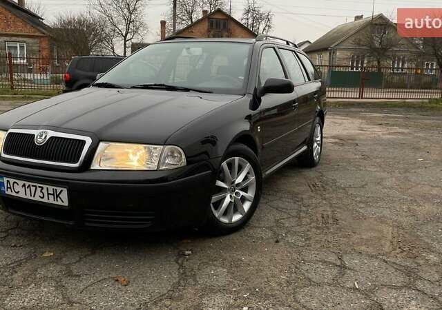 Черный Шкода Октавия, объемом двигателя 1.6 л и пробегом 206 тыс. км за 6300 $, фото 1 на Automoto.ua