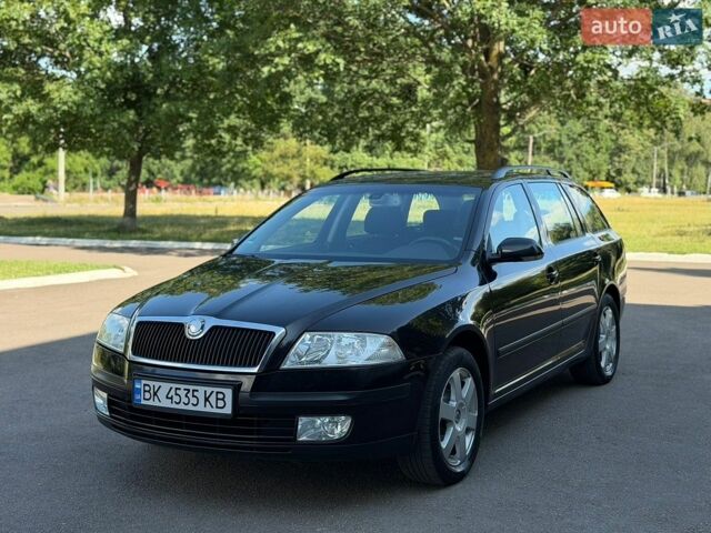 Черный Шкода Октавия, объемом двигателя 1.6 л и пробегом 250 тыс. км за 5300 $, фото 1 на Automoto.ua