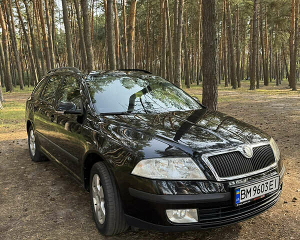 Черный Шкода Октавия, объемом двигателя 1.6 л и пробегом 244 тыс. км за 6400 $, фото 1 на Automoto.ua