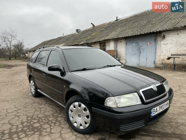 Черный Шкода Октавия, объемом двигателя 1.6 л и пробегом 260 тыс. км за 6100 $, фото 1 на Automoto.ua