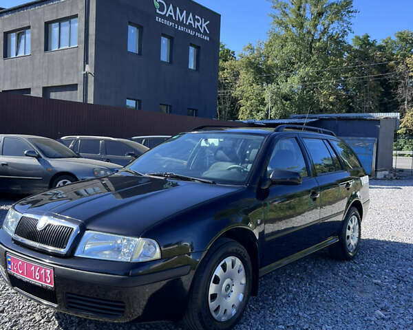 Черный Шкода Октавия, объемом двигателя 1.6 л и пробегом 234 тыс. км за 5999 $, фото 1 на Automoto.ua
