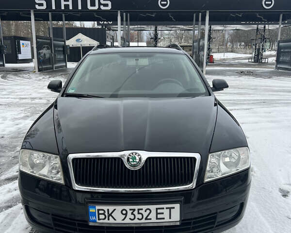 Черный Шкода Октавия, объемом двигателя 1.6 л и пробегом 251 тыс. км за 6800 $, фото 1 на Automoto.ua