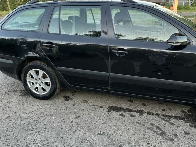 Черный Шкода Октавия, объемом двигателя 2 л и пробегом 225 тыс. км за 6100 $, фото 1 на Automoto.ua