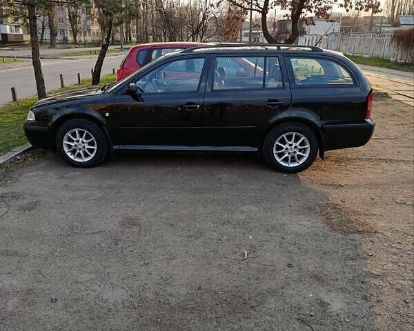 Чорний Шкода Октавія, об'ємом двигуна 1.6 л та пробігом 211 тис. км за 5300 $, фото 1 на Automoto.ua