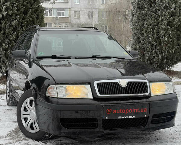 Черный Шкода Октавия, объемом двигателя 1.6 л и пробегом 198 тыс. км за 5900 $, фото 1 на Automoto.ua