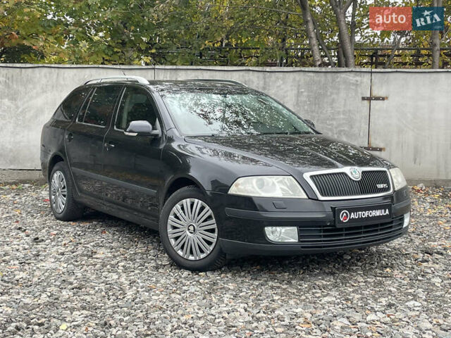 Черный Шкода Октавия, объемом двигателя 1.6 л и пробегом 226 тыс. км за 6290 $, фото 1 на Automoto.ua